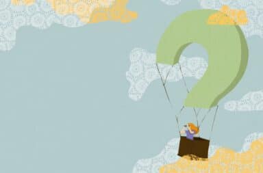 A person in a hot air balloon basket shaped like a question mark uses binoculars to look out at a sky filled with patterned clouds.